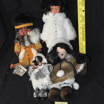 Four Native Dolls