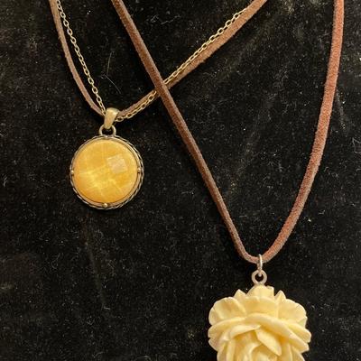 3 creamy/yellow color necklaces