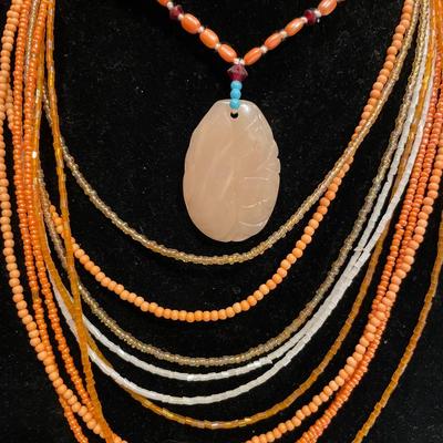 2 sunny tangerine color necklaces