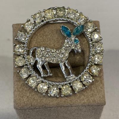 Rhinestone bracelet and donkey pin