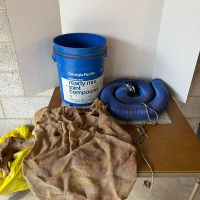 RV Hose, Bucket, and Burlap Sack