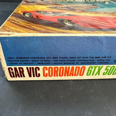 LOT 135X: 1/24 Scale Original 1966 Vintage Garvic Metallic Red Coronado GTX5000 Slot Car