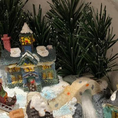 LOT 262 B: Vintage Animated Holiday Scene Writing Santa by Holiday Creations & Fiber Optic Rustic Village by Pule
