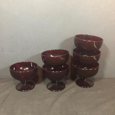 LOT 294B: Set of Red Glass Arcoroc Dishes