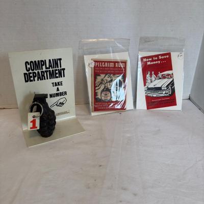 U 1258 "Complaint Department" Display With Pilgrim Rum Advertisement And Gas Advertisement