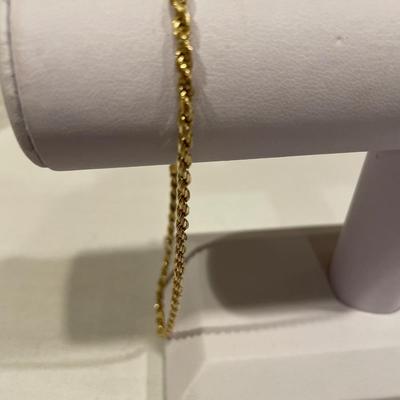 Vermeil ankle bracelet and gold tone pin