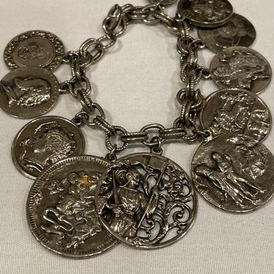 Incredible coin charm bracelet and fun coin earrings
