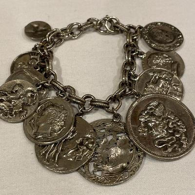 Incredible coin charm bracelet and fun coin earrings