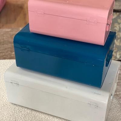 Pink, blue, and white cases