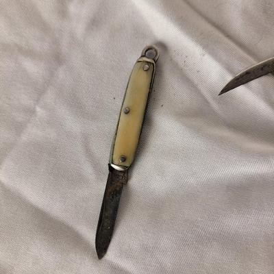 Two smaller vintage pocket knife/Keychain knives pearl iridescent