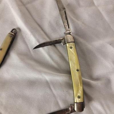 Two smaller vintage pocket knife/Keychain knives pearl iridescent