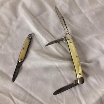 Two smaller vintage pocket knife/Keychain knives pearl iridescent