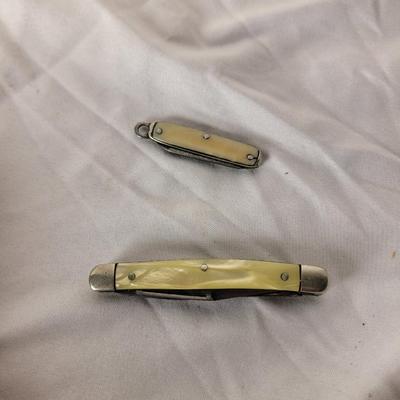 Two smaller vintage pocket knife/Keychain knives pearl iridescent