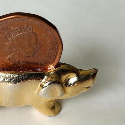 Pig Figurine with Elizabeth II Coin