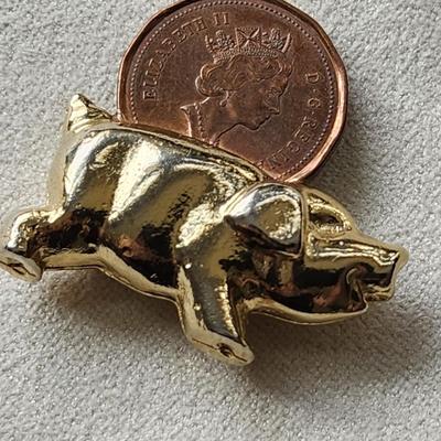 Pig Figurine with Elizabeth II Coin