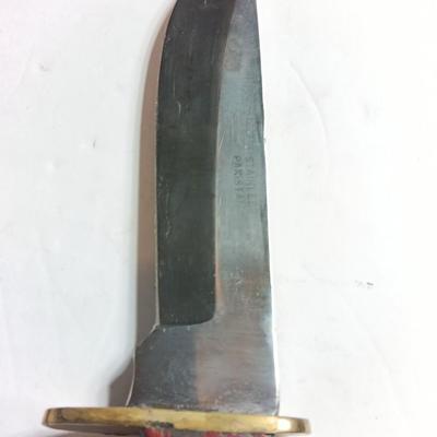 Stainless Pakistan made knife with beautiful multicolored wooden handle.