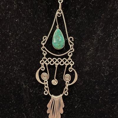 Native American design pendant and earrings