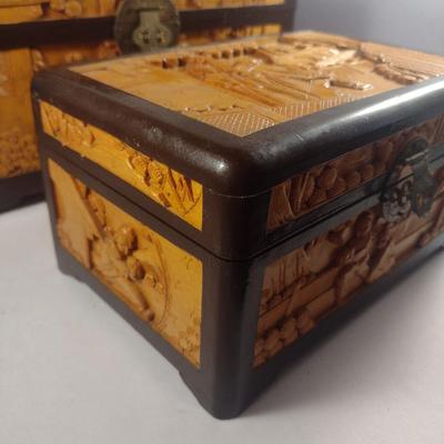Set of Three High Relief Carved Camphor Wood Storage Boxes