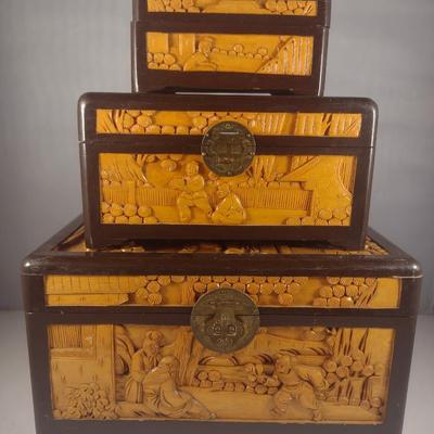 Set of Three High Relief Carved Camphor Wood Storage Boxes