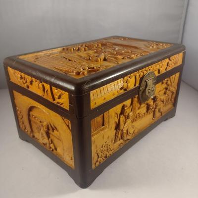 Set of Three High Relief Carved Camphor Wood Storage Boxes