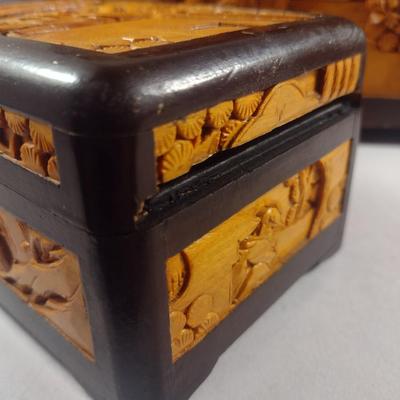 Set of Three High Relief Carved Camphor Wood Storage Boxes