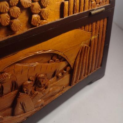 Set of Three High Relief Carved Camphor Wood Storage Boxes