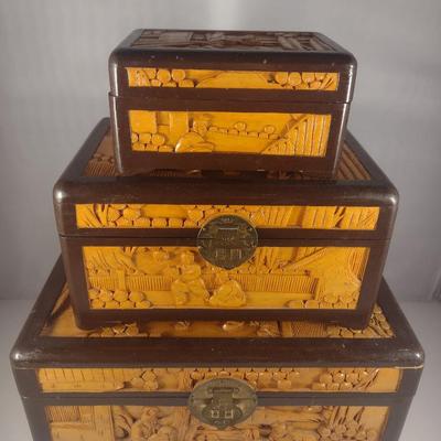 Set of Three High Relief Carved Camphor Wood Storage Boxes