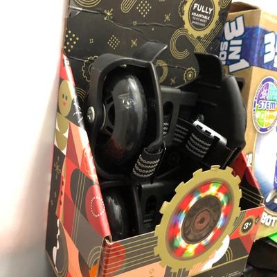 New in Box; Clip-N-Roll Skates, Nerf Firetek Bow & 3 in 1 Spider & Solar Robot