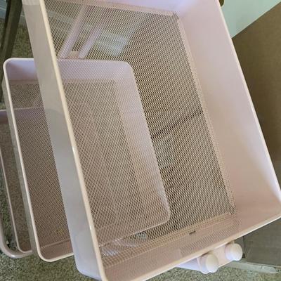 Pink Metal Organizer Shelf On Casters
