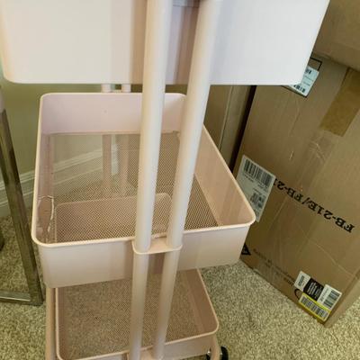 Pink Metal Organizer Shelf On Casters
