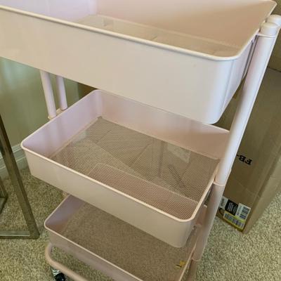 Pink Metal Organizer Shelf On Casters