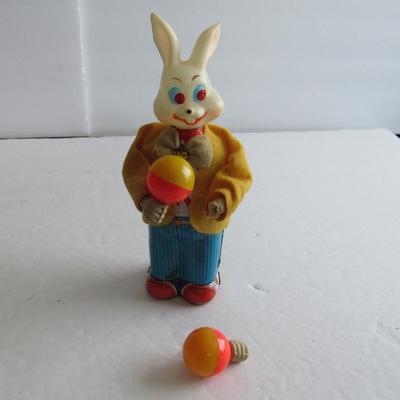 Lot 349: Lot of Misc Toys, Wind Up Rabbit, Francie Jacket, Mr Peanut Charms, Revell Box