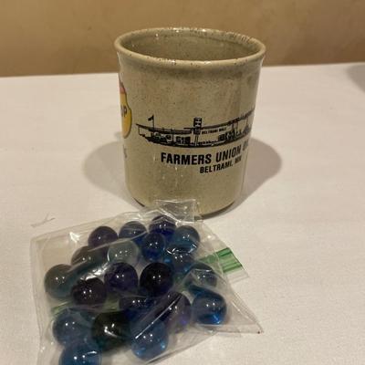 Beautiful blue marbles and mug