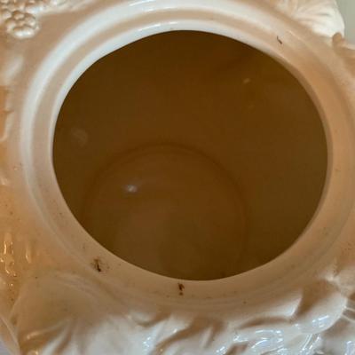 Vintage white tea pot with cherubs