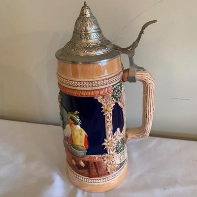 German beer stein with hinged pewter lid