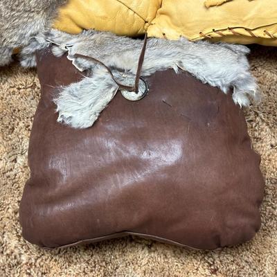 LEATHER AND FUR COVERED THROW PILLOWS