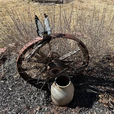ANTIQUE WAGON WHEEL AND A METAL CONTAINER