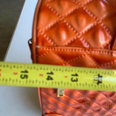 Nicole Miller Rolling Extending Handle Carry On Luggage