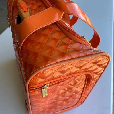Nicole Miller Rolling Extending Handle Carry On Luggage