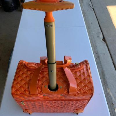 Nicole Miller Rolling Extending Handle Carry On Luggage