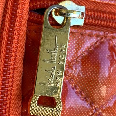 Nicole Miller Rolling Extending Handle Carry On Luggage