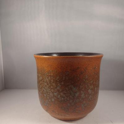 Collection of Kitchen Utensils in Ceramic Holder