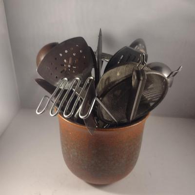 Collection of Kitchen Utensils in Ceramic Holder