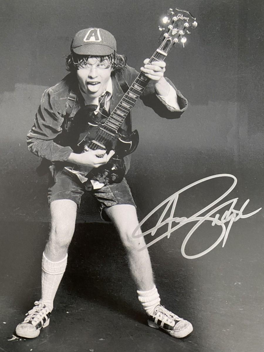 AC/DC Angus Young signed photo | EstateSales.org