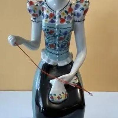 Hungarian Hollohaza Girl Sewing Figurine 9.25" Tall in VG Preowned Condition Preowned from an Estate. Very Nicely Done.