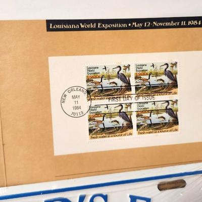 Lot #78 World's Fair Lot - Stamps, License Plate, Trivet, Cup, Game