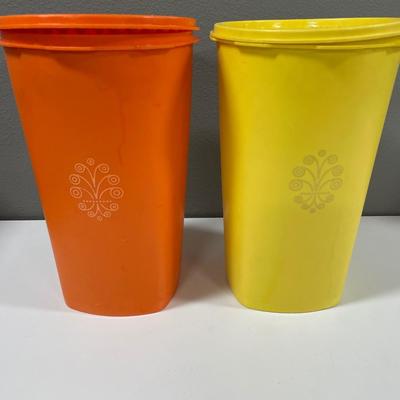 2 tall Tupperware containers