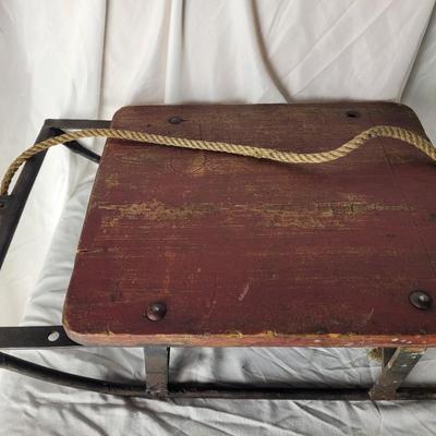 Small antique wooden sled. The wooden part measures