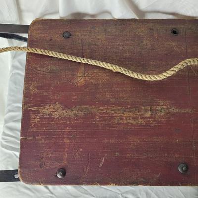 Small antique wooden sled. The wooden part measures
