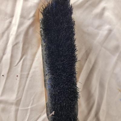 Antique marketing giveaway lint or upholstery brush.